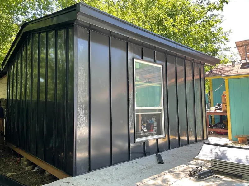 Black standing seam metal wall panels for Roof Inspection in Whittier