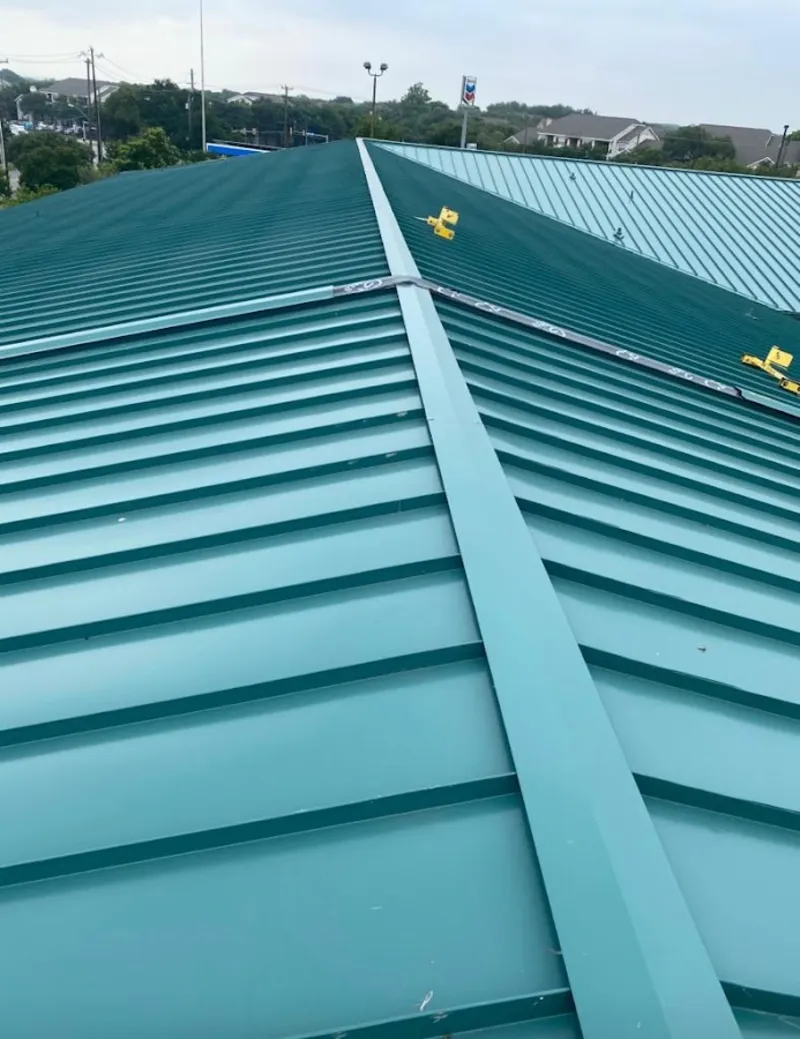Green commercial metal roof ridge and valley for Metal Roof Repair in Whittier