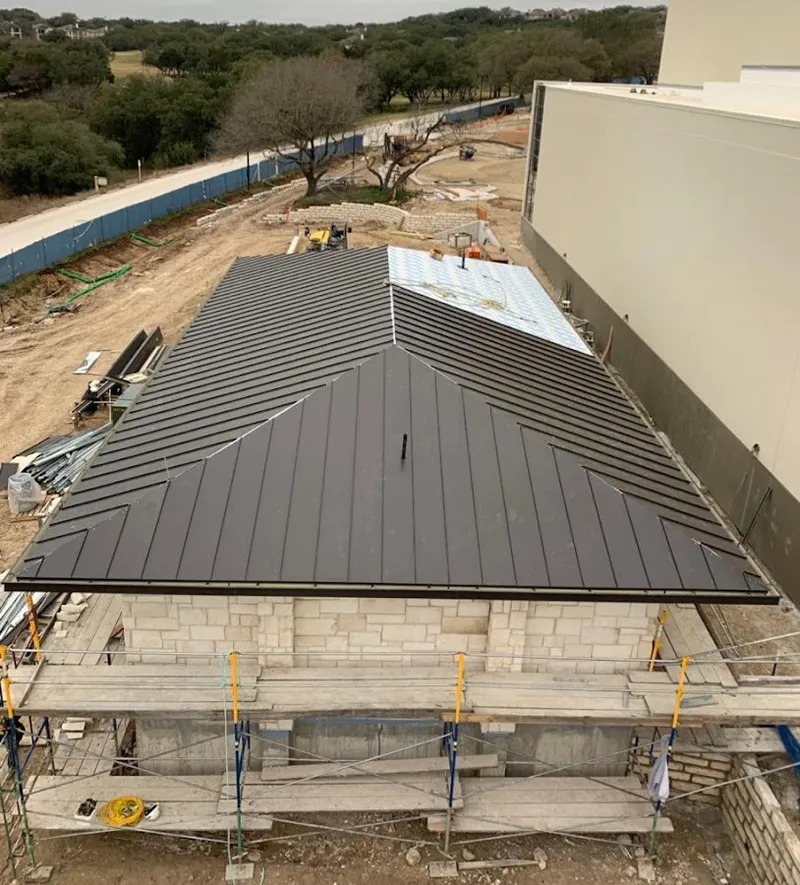 Metal roof new construction with scaffolding in Whittier